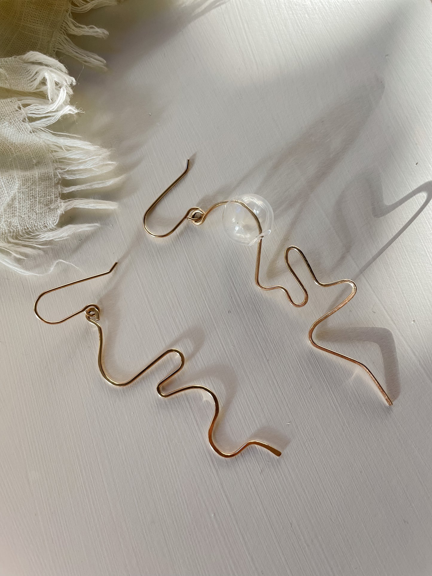 The Cursive Dangles