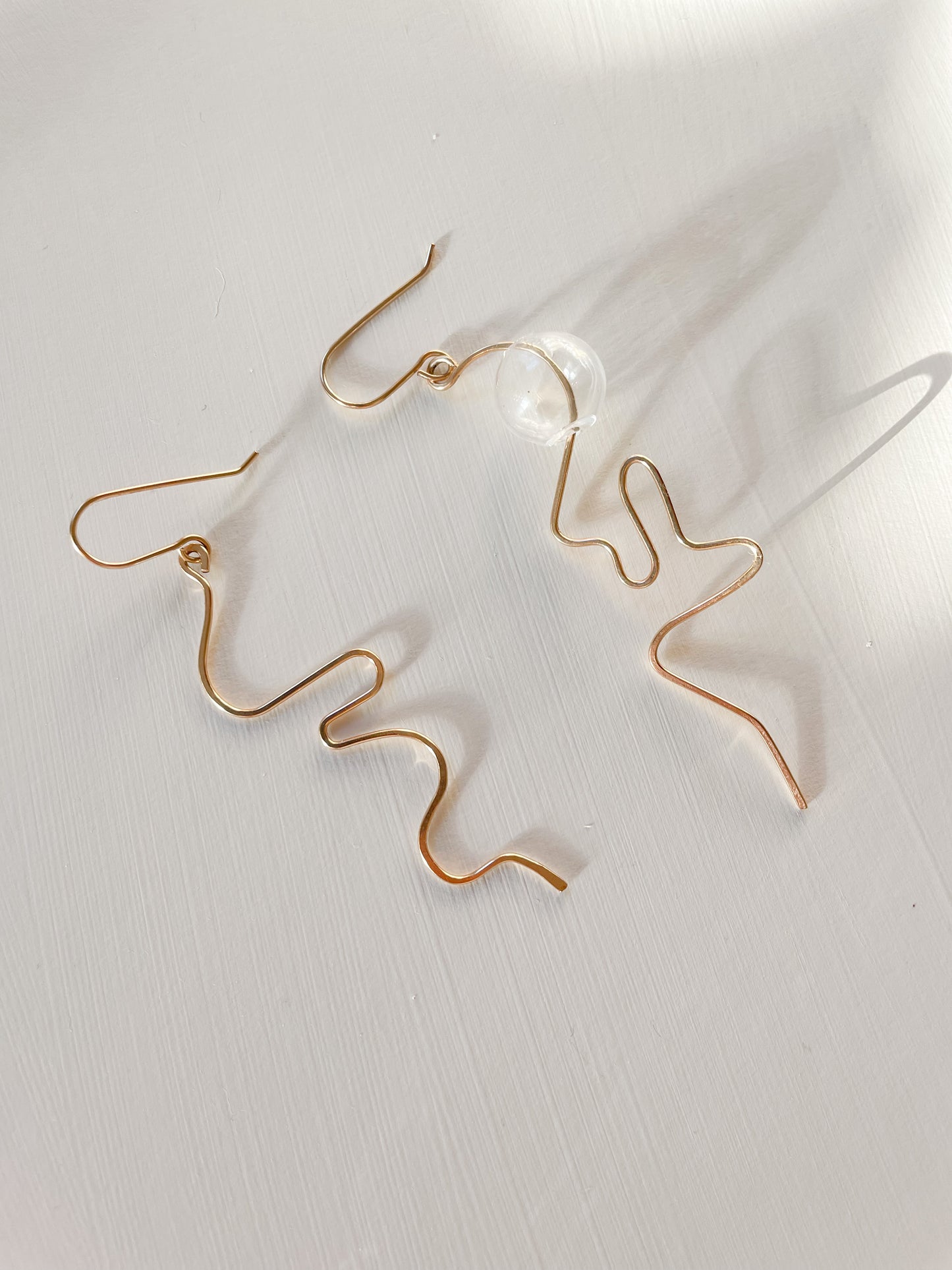 The Cursive Dangles