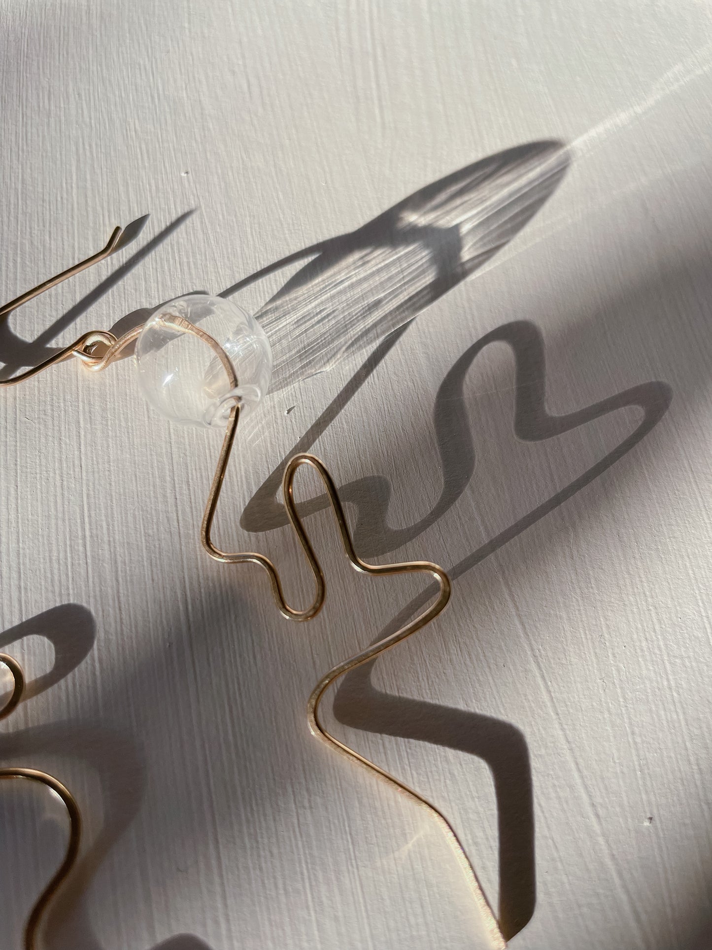 The Cursive Dangles