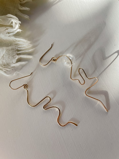 The Cursive Dangles