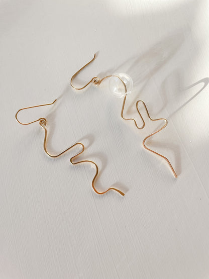 The Cursive Dangles